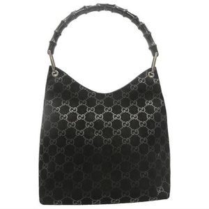 Authentic/Vintage (used) black suede Gucci purse with bamboo handle